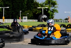 Nottingham Outdoor go Karting racer in yellow race suit