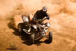 Quad biking and kicking up dirt